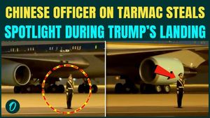 Chinese Officer HIJACKS Trump’s Spotlight; Stands Still as Trump’s Air Force One Passes By | VIDEO