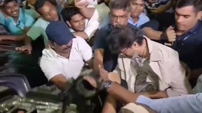 Watch: Thalapathy Vijay Briefly Falls at Chennai Airport as Fans Mob Him