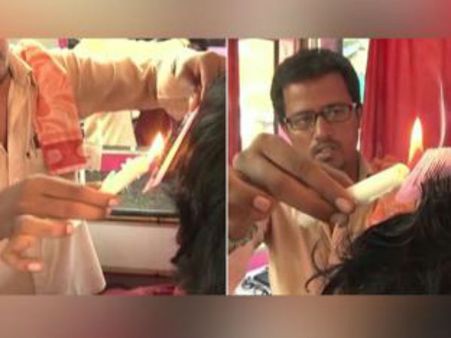 জ্বলন্ত মোমবাতি দিয়ে হেয়ারকাট? বিশ্বাস না হলে দেখে নিন ভিডিওটি