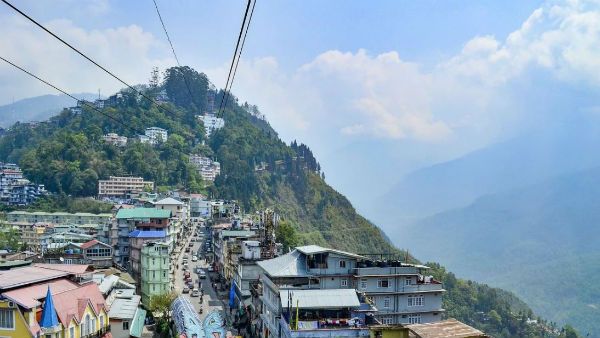 হাঁসফাঁস গরম থেকে বাঁচতে কয়েকটা দিন কাটিয়ে আসুন ভারত-ভুটান সীমান্তের ছোট্ট গ্রাম চিসাংয়ে