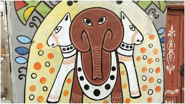 Travel: রাস্তাই যেন রঙিন ক্যানভাস, ছুটির দিনে একটা বেলা ঘুরে আসুন শহর কলকাতার এই গলিতে