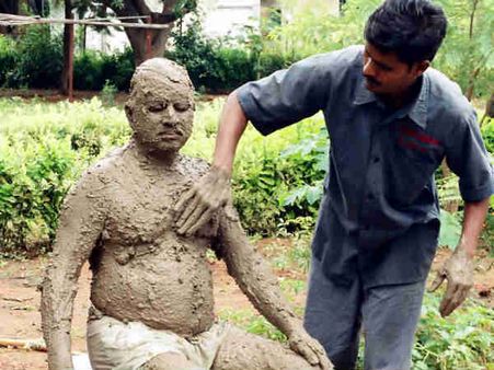 કિચડમાં સ્નાન 