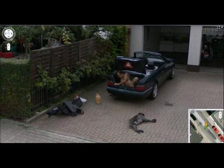 Naked Man Climbing Out of a Trunk