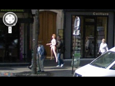 Man Carrying a Sex Doll on the Sidewalk