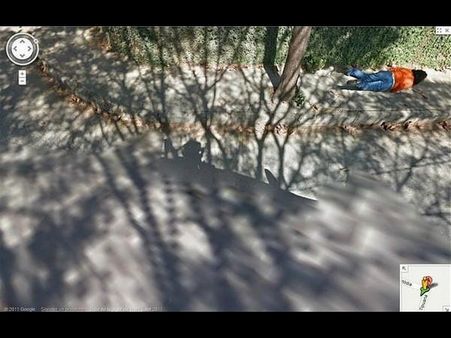 Woman, Doing the Worm on a Sidewalk