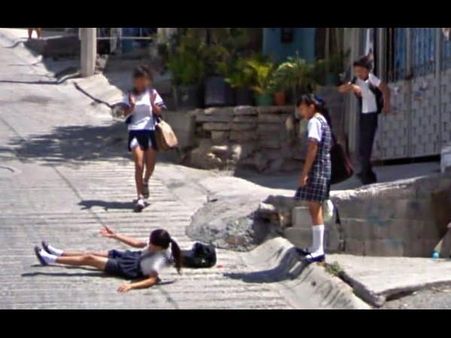 Girls Laughing at Their Fallen Friend