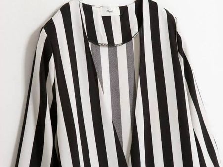 ધારીદાર સૂટ પહેરીને પુરૂષો પર ચાકુ ફેંકવું ગેરકાનૂની છે-કેન્સાસ