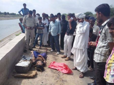 પત્થર સાથે બાંધેલી મહિલાની લાશ મળતા ચકચાર