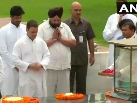 મહાત્મા ગાંધીની સમાધિ પર રાહુલે ચડાવ્યુ કૈલાશ માનસરોવરથી લાવેલુ જળ