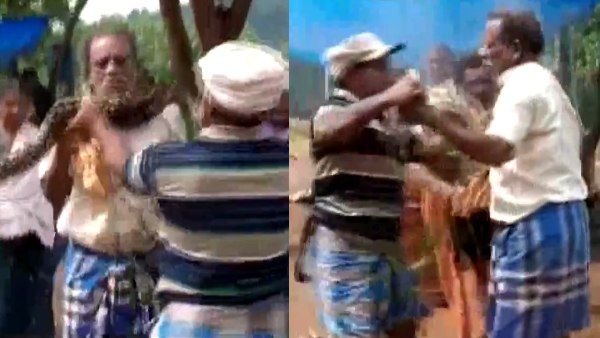 10 ફૂટના અજગરે ગળું પકડ્યું 10 ફૂટના અજગરે ગળું પકડ્યું