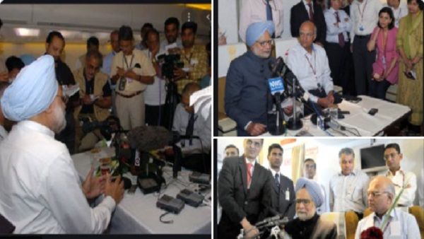 PM મોદીએ શેર કરી ફ્લાઇટના અંદર ફાઇલ તપાસતા ફોટો, કોંગ્રેસે મનમોહન સિંહની તસવીરથી કર્યો પલટવાર