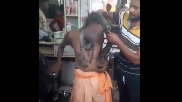 ભિક્ષા માંગી રહેલા સાધુની કાતરથી કાપી જટાઓ.. માર્યા લાફા, ભાજપ કાર્યકર્તાએ રસ્તા પર ઢસડ્યો