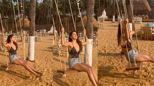 બોલ્ડ અંદાજમાં બીચ પર ઝૂલા ઝૂલતી જોવા મળી રિયા ચક્રવર્તી, જુઓ વીડિયો