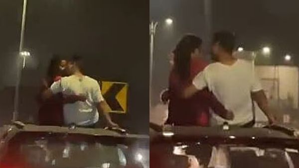 Video : ચાલુ કારના સનરુફમાં કિસિંગ કરતુ કપલ કેમેરામાં કેદ, વીડિયો સોશિયલ મીડિયા પર વાયરલ