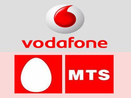 वोडाफोन को 11,000 करोड़ की छूट, खुर्शीद से मिले प्रणव