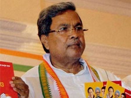 कर्नाटक कांग्रेस ने दिया 'मनमोहन गांधी' को धन्‍यवाद