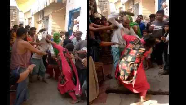वीडियो में देखिए, दबंग व्यक्ति ने महिला को सरेआम चप्पलों से मारा, लोग देखते रहे तमाशा