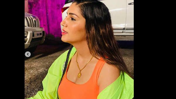 सपना चौधरी ने कराया हॉट फोटोशूट, ऑरेंज टॉप में दिलकश नजर आईं, तस्वीरें वायरल