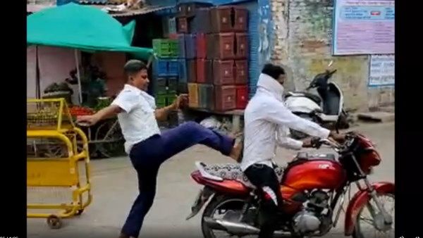 बाइक सवार की हीरो वाली एंट्री तो पुलिस वाले का 'सिंघम' अंदाज, देखिए ये रियल लाइफ का एक्शन सीन