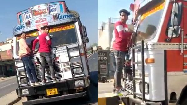 Viral Video: टक्कर के बाद ट्रक पर लटके रहे बाइक सवार, ड्राइवर ने नहीं हटाया एक्सीलेटर से पैर, भगाता रहा वाहन