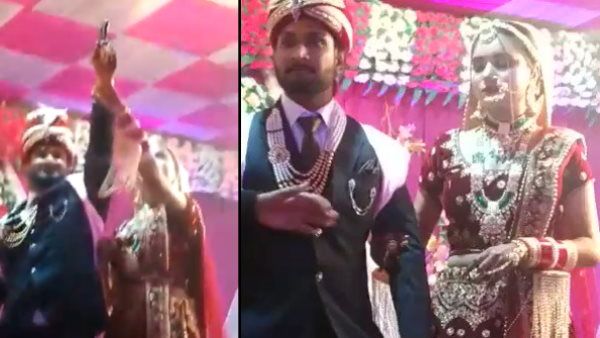 VIDEO: स्टेज पर खड़े होकर दूल्हे ने दागी 4 गोलियां, खुशी से झूम उठी दुल्हन ने लगाया हाथ, वीडियो वायरल