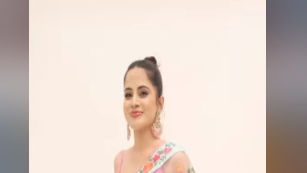 टांसपेरेंट व्‍हाइट साड़ी संग डीप नेक ब्लाउज पहनकर Urfi Javed ने लगाए ठुमके,देखें वीडियो