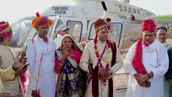 Rajasthan : दुल्हनिया लाने हेलिकॉप्टर से पहुंचा मजदूर का शिक्षक बेटा, पिता का सपना हुआ पूरा