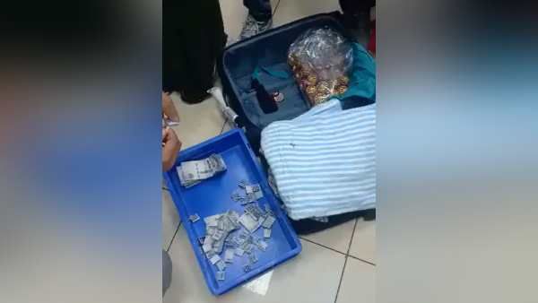 VIDEO : लहंगे के बटन में छिपाए 41 लाख रुपये, एयरपोर्ट पर CISF ने दबोचा