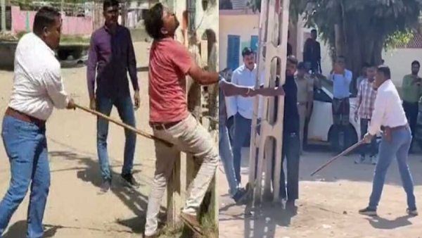 गुजरात: रात में किया गरबा कार्यक्रम पर पथराव, अगले दिन पुलिस ने खंभे से बांधकर आरोपियों पर लट्ठे बरसाए, Video