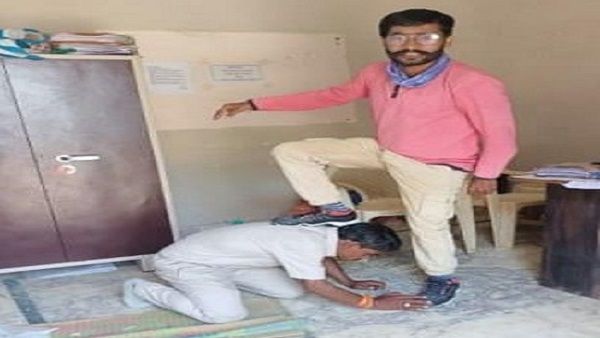 Sagar: जप सदस्य के सिर पर पैर रखने वाला पटवारी सस्पैंड, कलेक्टर ने कहा-प्रशासन की छवि धूमिल