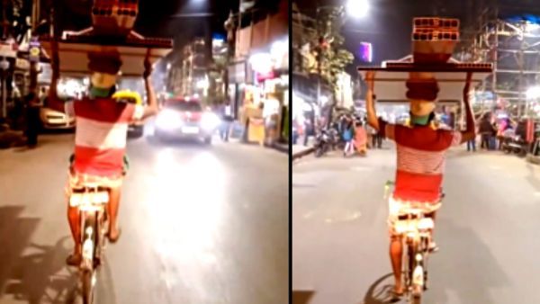वाह! कमाल का टैलेंट है...सिर पर सामान रख साइकिल चला रहा शख्स, लोग बोले- 'ये रोकेगा कैसे?'
