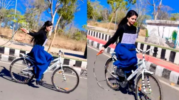 स्किपिंग रोप से साइकिल पर लड़की ने किया खतरनाक स्टंट, वीडियो देख चकराया लोगों का सिर