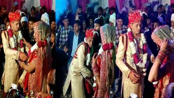 जयमाला डालने से पहले किसी ने फोड़ दिया पटाखा, डर के मारे स्टेज पर दूल्हे का हुआ ये हाल, Video Viral