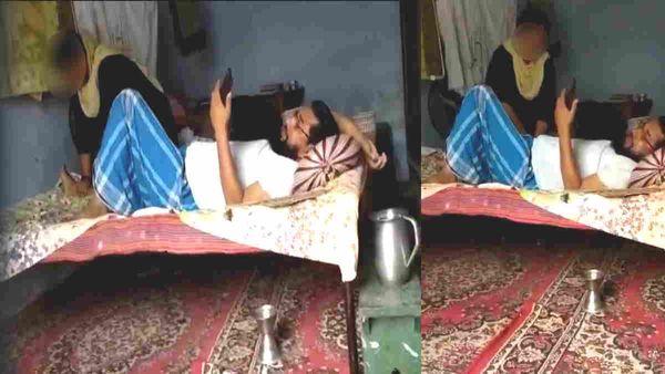 खाट पर आराम फरमाते मदरसे के प्रिंसिपल साहब, पैरों की मालिश करती महिला रसोईया, वीडियो हुआ वायरल