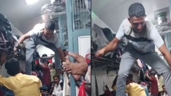 ट्रेन के वॉशरूम तक पहुंचने के लिए 'स्पाइडर मैन' बना शख्स! वायरल हुआ VIDEO
