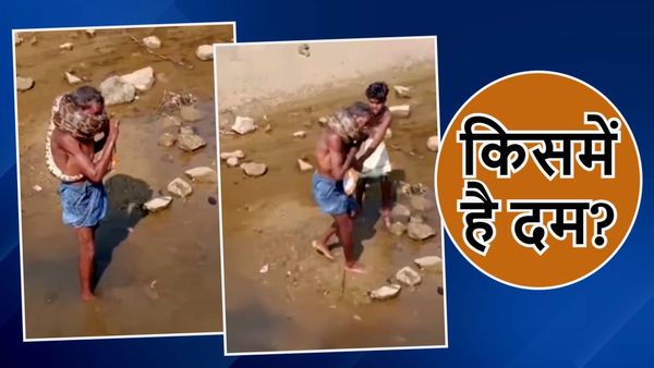 OMG! अजगर की चपेट में शख्स की गर्दन, छूटने की कसरत में घुटने लगा दम, VIDEO में देखें मौत का खेल
