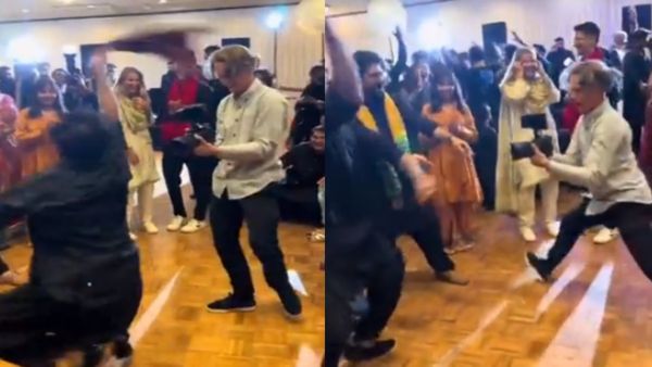 एक हाथ में कैमरा और दूसरे हाथ से डांस मूव्स, कैमरामैन का ये अंदाज आपको भी फिदा कर देगा