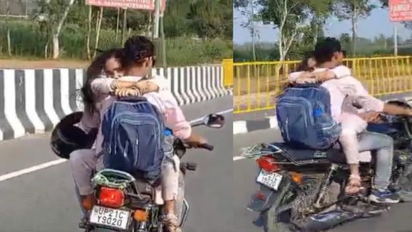 'मोहब्बत का भूत उतर जाएगा...' बीच सड़क पर चलती बाइक पर रोमांस करता दिखा कपल, वीडियो देखकर लोगों ने कही ये बात