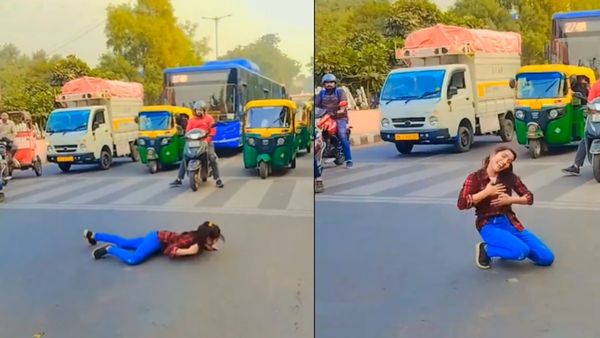 रेड लाइट पर रुके वाहन मगर ये लड़की नहीं, बीच सड़क पर लेट-लेटकर करने लगी डांस, VIDEO हुआ वायरल