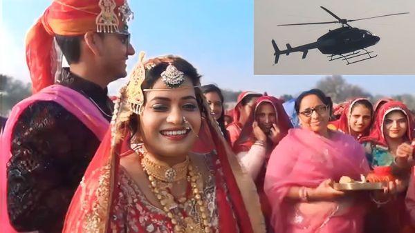VIDEO: IPS दूल्‍हा Devendra हेलीकाप्टर में बैठाकर लाया IAS दुल्‍हन Aparajita, देखने उमड़ा पूरा गांव