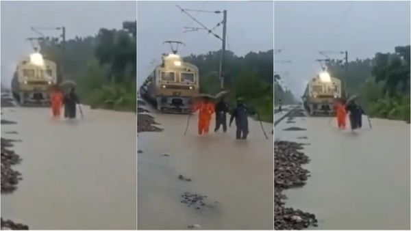 MP में बाढ़ का ऐसा सितम की ट्रेन को भी दिखाना पड़ा रास्ता, कर्मचारियों के पीछे-पीछे चलती रेल का वीडियो वायरल