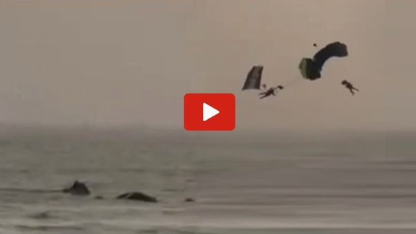 Video: पैराशूट में फंसकर समद्र में गिरे नौसेना अधिकारी, कैसे बची जान?