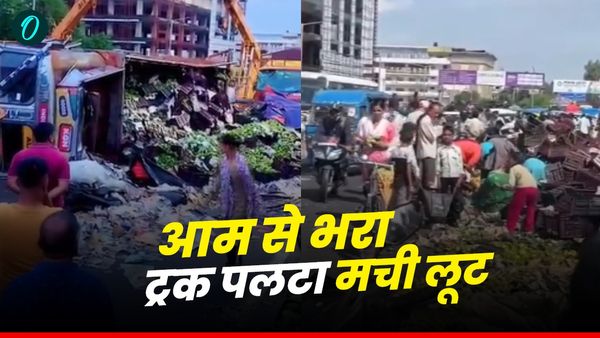 Dehradun news: रिस्पना पुल पर अचानक पलटा ट्रक, सड़क पर बिखरे आम ही आम, मची अफरातफरी और लूट