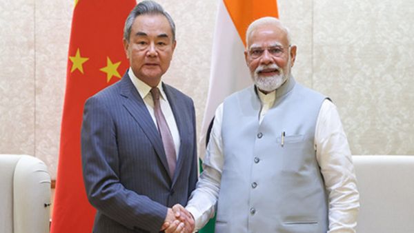 चाइना के साथ सुधरते संबंध के बीच PM मोदी ने वांग यी से की मुलाकात, बोले- SCO का बेसब्री से इंतजार है