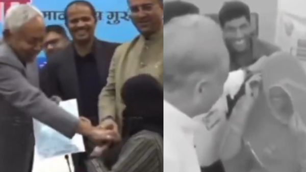 Nitish Kumar Hijab: नीतीश के हिजाब विवाद पर BJP का पलटवार, महिला का घूंघट हटाते कांग्रेस नेता का वीडियो वायरल