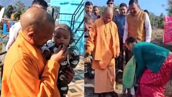 UP CM Yogi Adityanath उत्तराखंड में पैतृक गांव पंचूर में बच्चों से मिले, चॉकलेट बांटी,कहा-हम भी तेरे दादा लगते