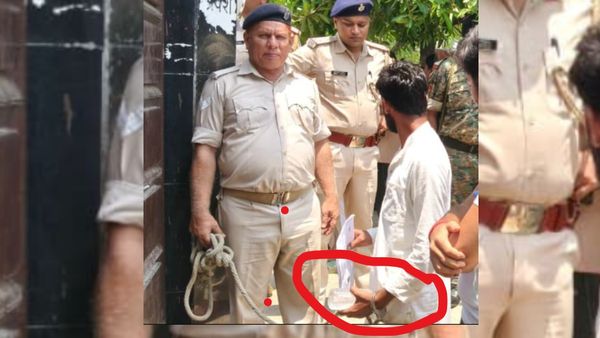 NEET Re-Exam: हाथों में हथकड़ी पहन नीट का पेपर देने पहुंचा छात्र कौन, किस जुर्म में है जेल में बंद?