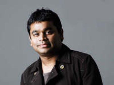 Rahman receives Oscars, thanks mother, God