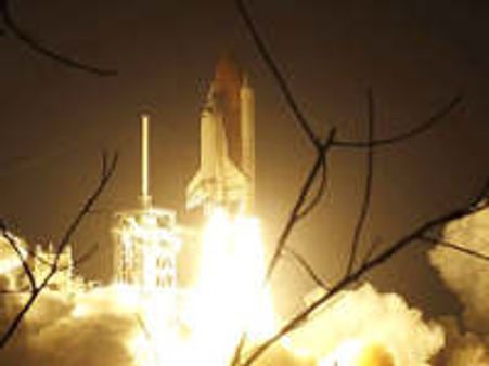 Space shuttle Discovery makes safe return