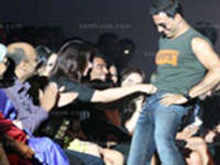 Unbuttoning Akki lands Twinkle in jail